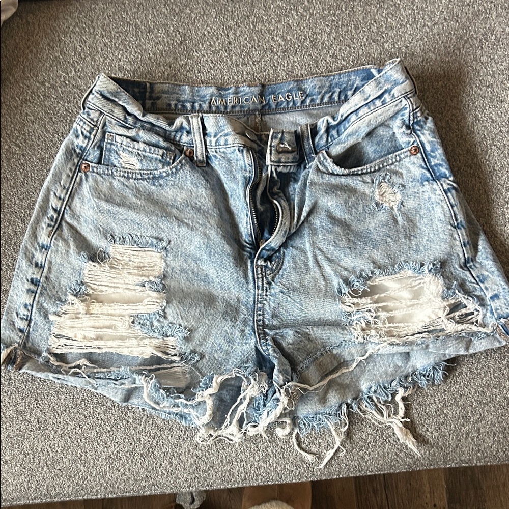 American Eagle Outfitters Light Blue Distressed mom Short. Stain on the back